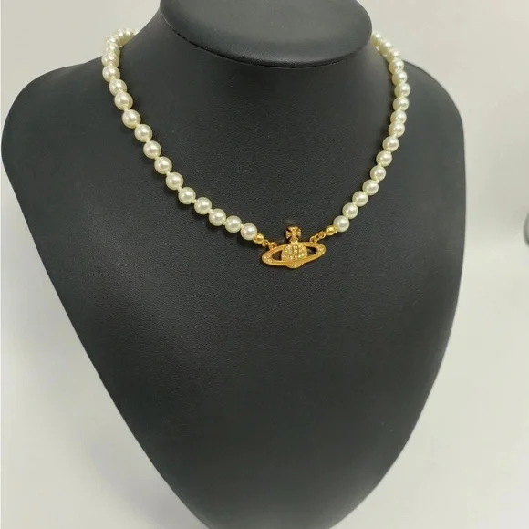 Vivienne Westwood Pearl Necklace with Gold Mini Saturn Pendant